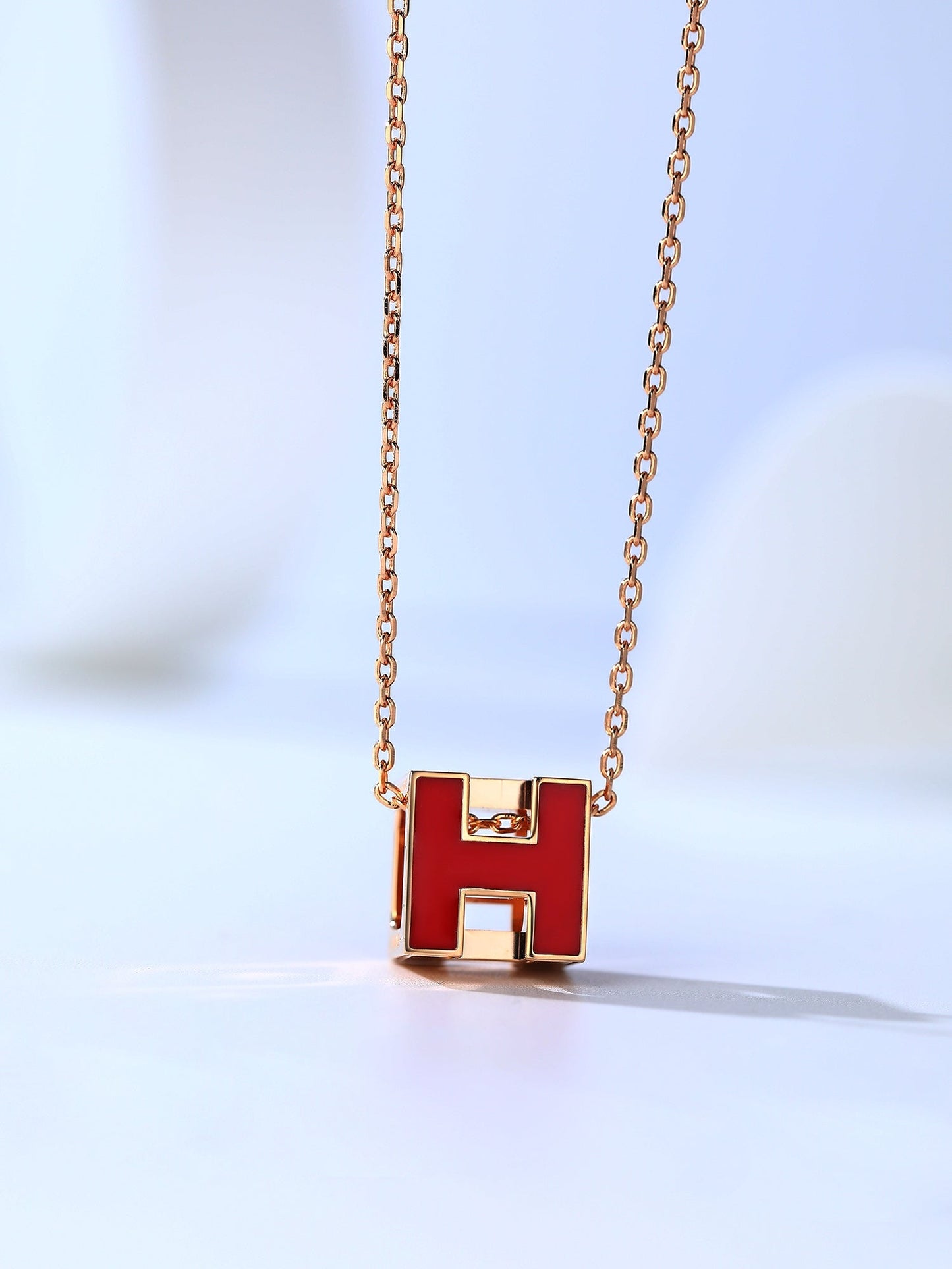 LUXEIFY H CAGE PINK GOLD NECKLACE
