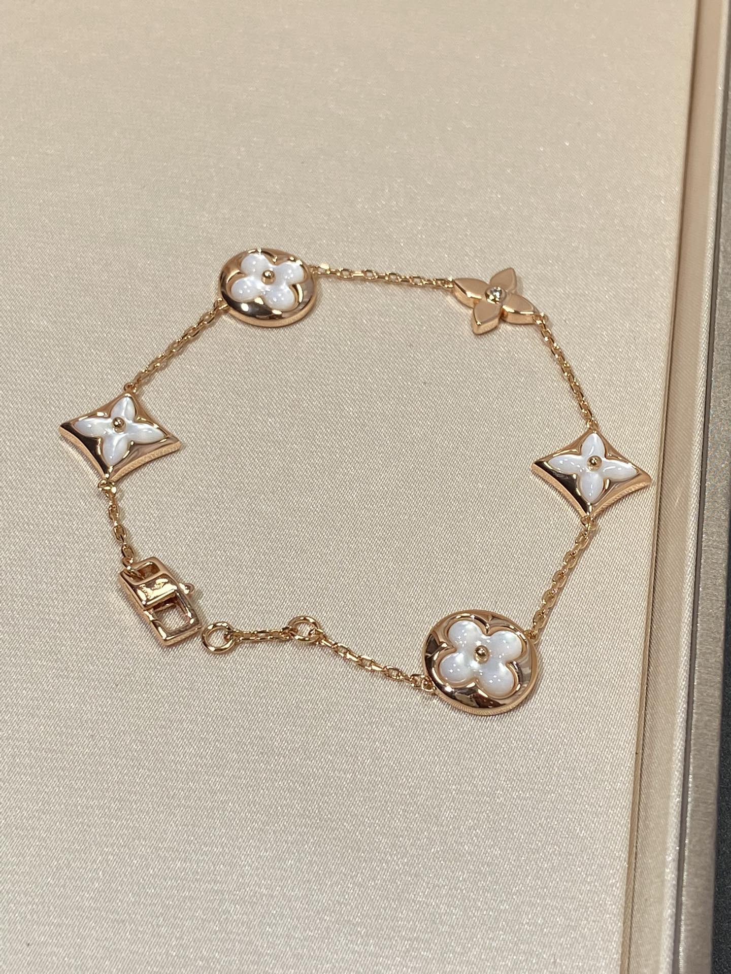 LUXEIFY STAR AND SUN 5 MOTIF MOP PINK GOLD BRACELET