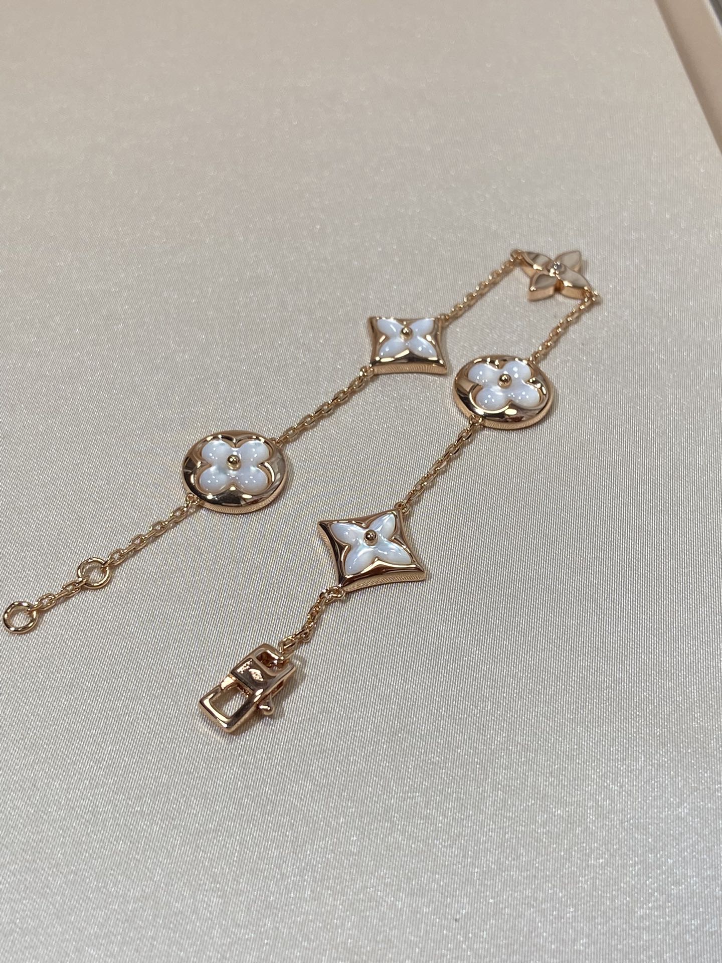 LUXEIFY STAR AND SUN 5 MOTIF MOP PINK GOLD BRACELET