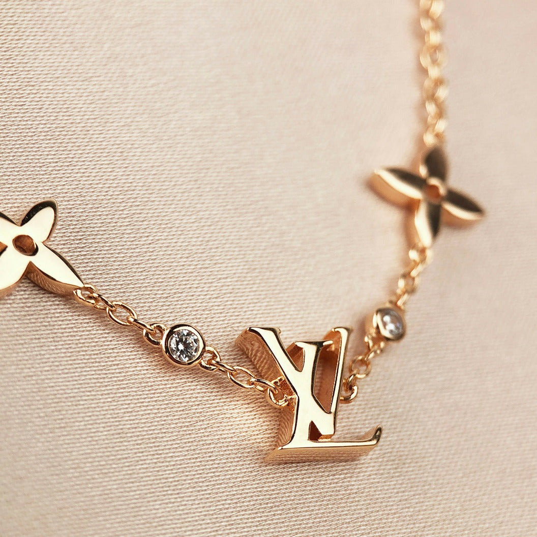 LUXEIFY STAR AND SUN 7 MOTIFS GOLD BRACELET