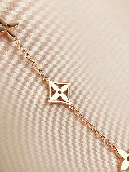 LUXEIFY STAR AND SUN 7 MOTIFS GOLD BRACELET
