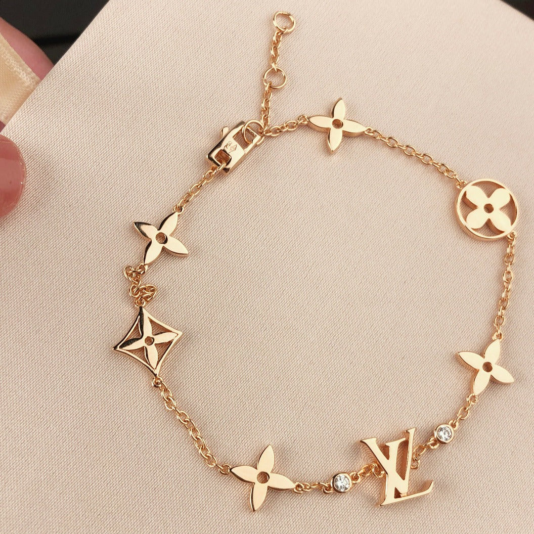 LUXEIFY STAR AND SUN 7 MOTIFS GOLD BRACELET