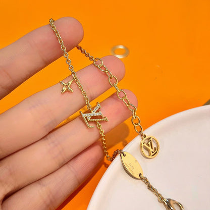 LUXEIFY LOGO STAR MOTIF GOLD BRACELET