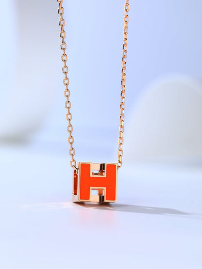 LUXEIFY H CAGE PINK GOLD NECKLACE