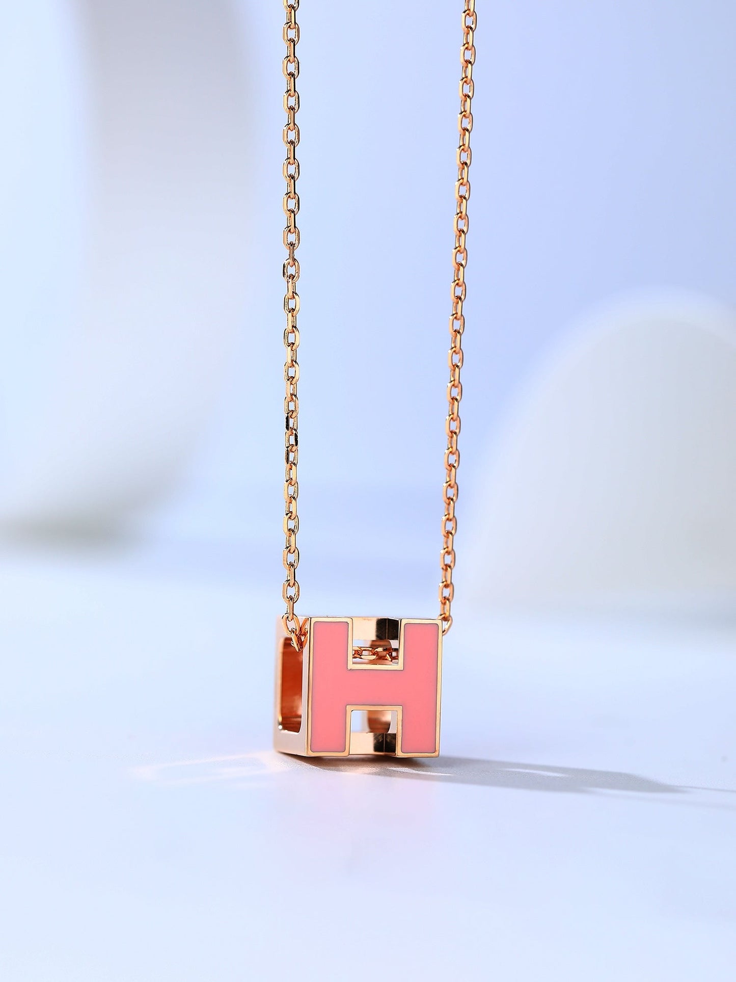LUXEIFY H CAGE PINK GOLD NECKLACE