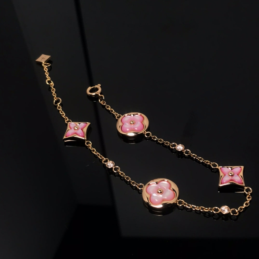 LUXEIFY STAR AND SUN 4 MOTIF PINK MOP PINK GOLD BRACELET