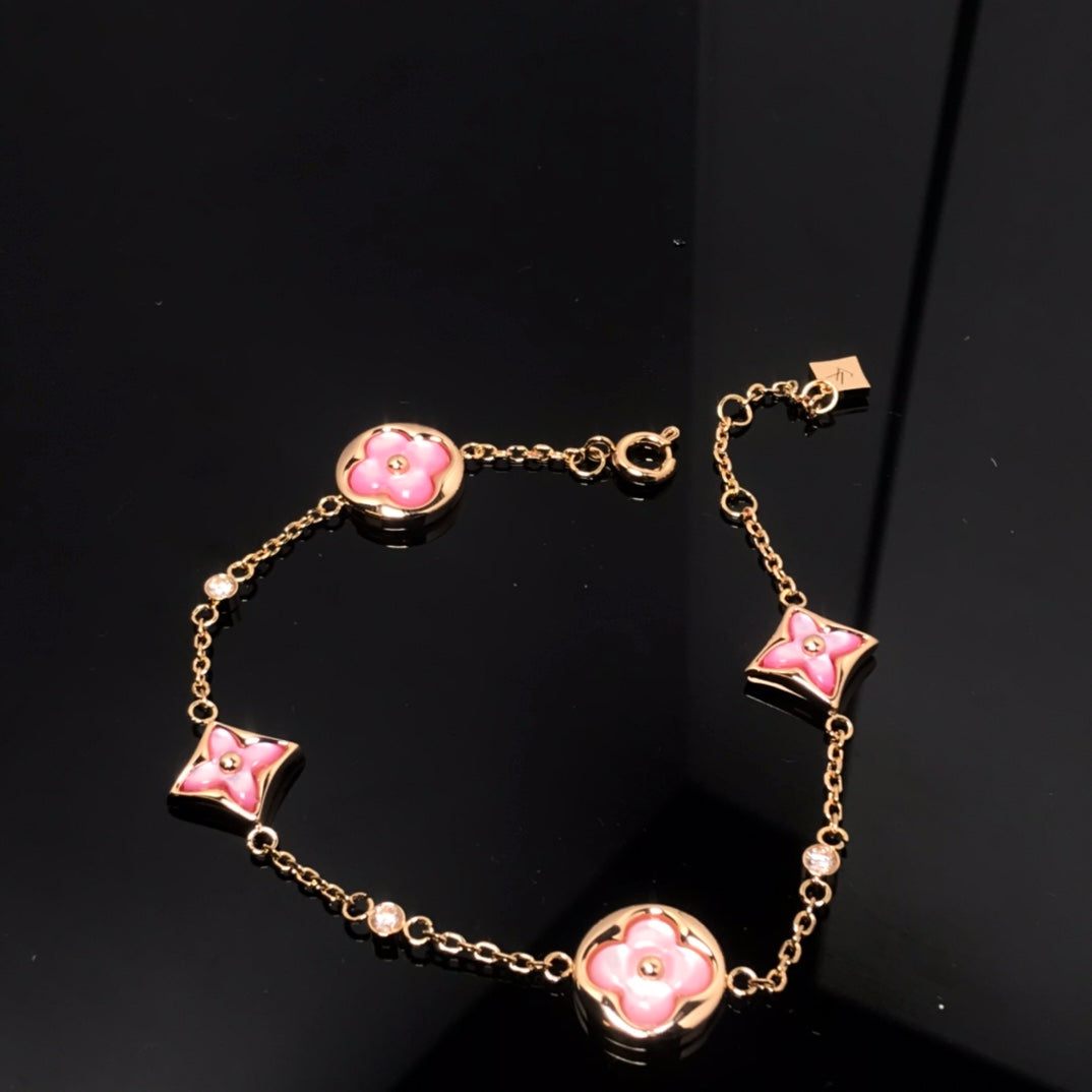 LUXEIFY STAR AND SUN 4 MOTIF PINK MOP PINK GOLD BRACELET