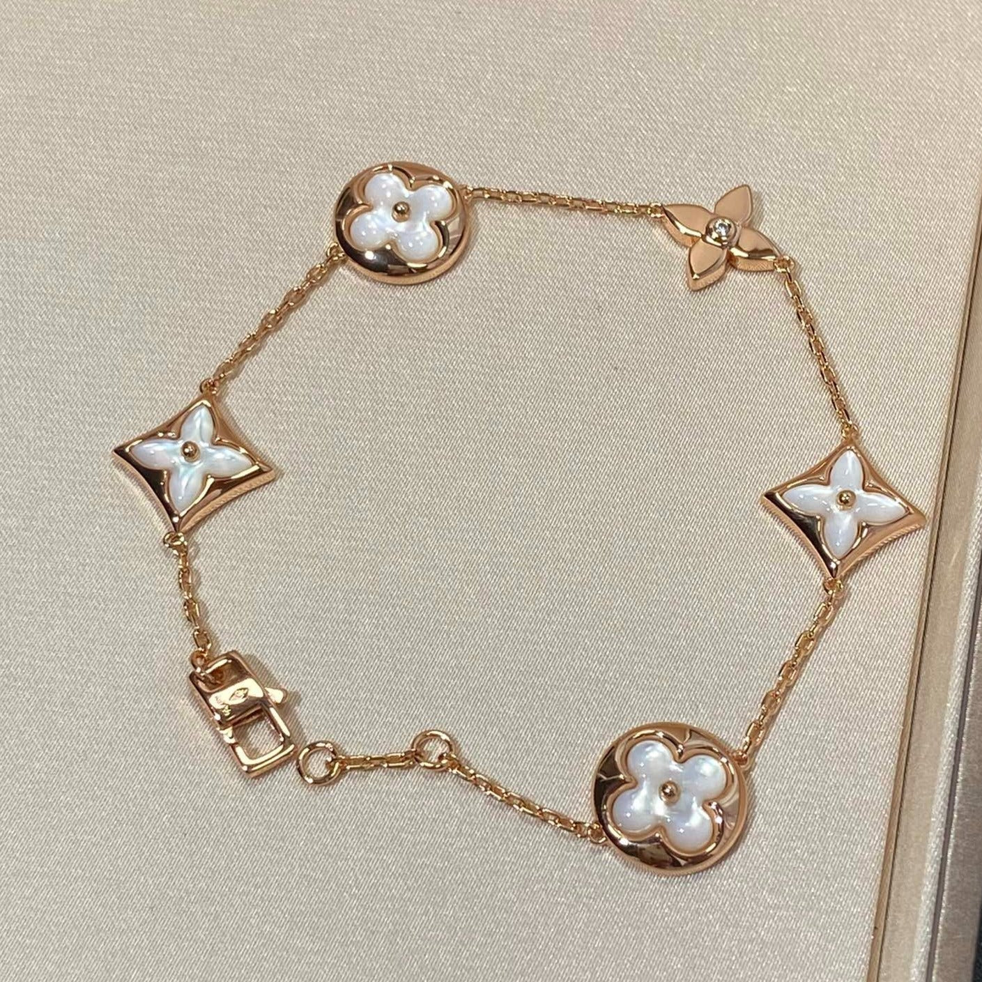 LUXEIFY STAR AND SUN 5 MOTIF MOP PINK GOLD BRACELET