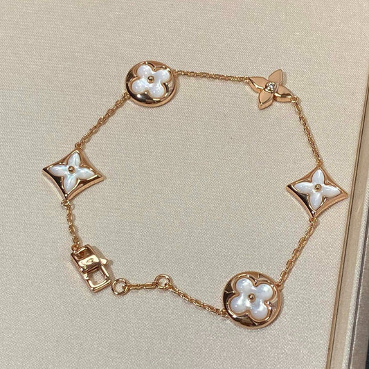 LUXEIFY STAR AND SUN 5 MOTIF MOP PINK GOLD BRACELET