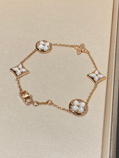 LUXEIFY STAR AND SUN 5 MOTIF MOP PINK GOLD BRACELET