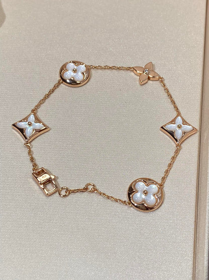 LUXEIFY STAR AND SUN 5 MOTIF MOP PINK GOLD BRACELET