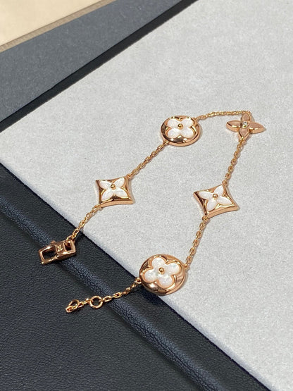 LUXEIFY STAR AND SUN 5 MOTIF MOP PINK GOLD BRACELET