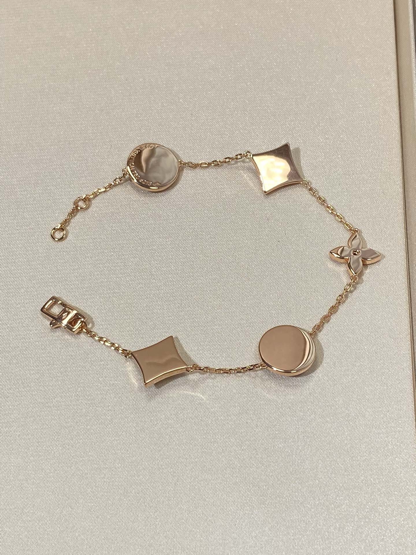 LUXEIFY STAR AND SUN 5 MOTIF MOP PINK GOLD BRACELET