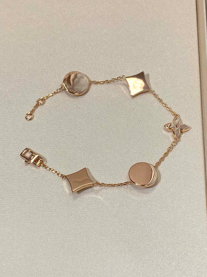LUXEIFY STAR AND SUN 5 MOTIF MOP PINK GOLD BRACELET