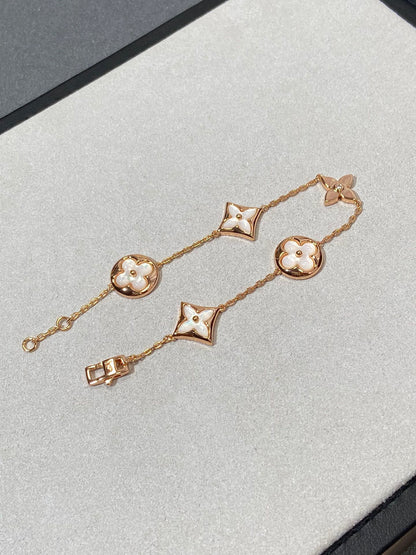 LUXEIFY STAR AND SUN 5 MOTIF MOP PINK GOLD BRACELET