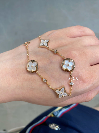 LUXEIFY STAR AND SUN 4 MOTIF WHITE MOP PINK GOLD BRACELET