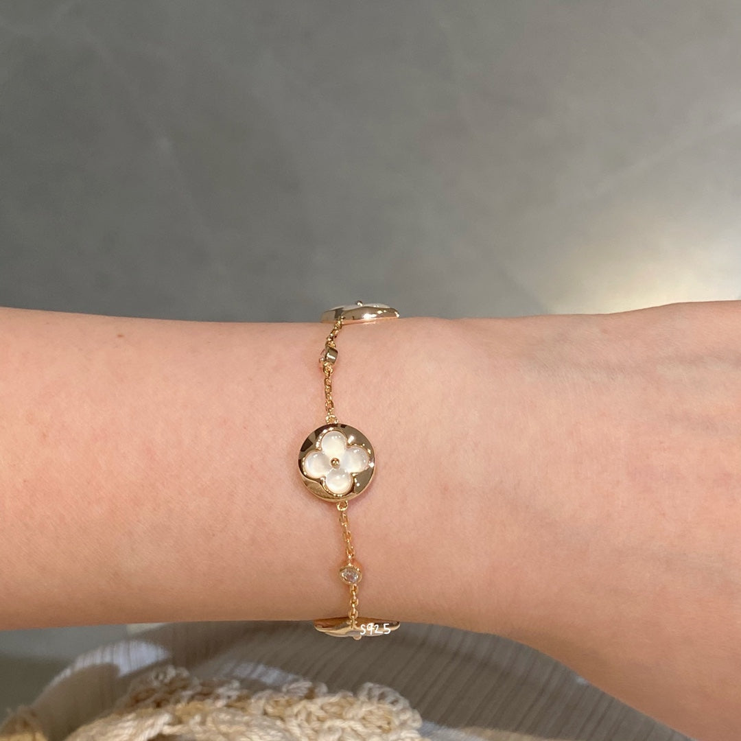 LUXEIFY STAR AND SUN 4 MOTIF WHITE MOP PINK GOLD BRACELET