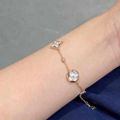 LUXEIFY STAR AND SUN 4 MOTIF WHITE MOP PINK GOLD BRACELET