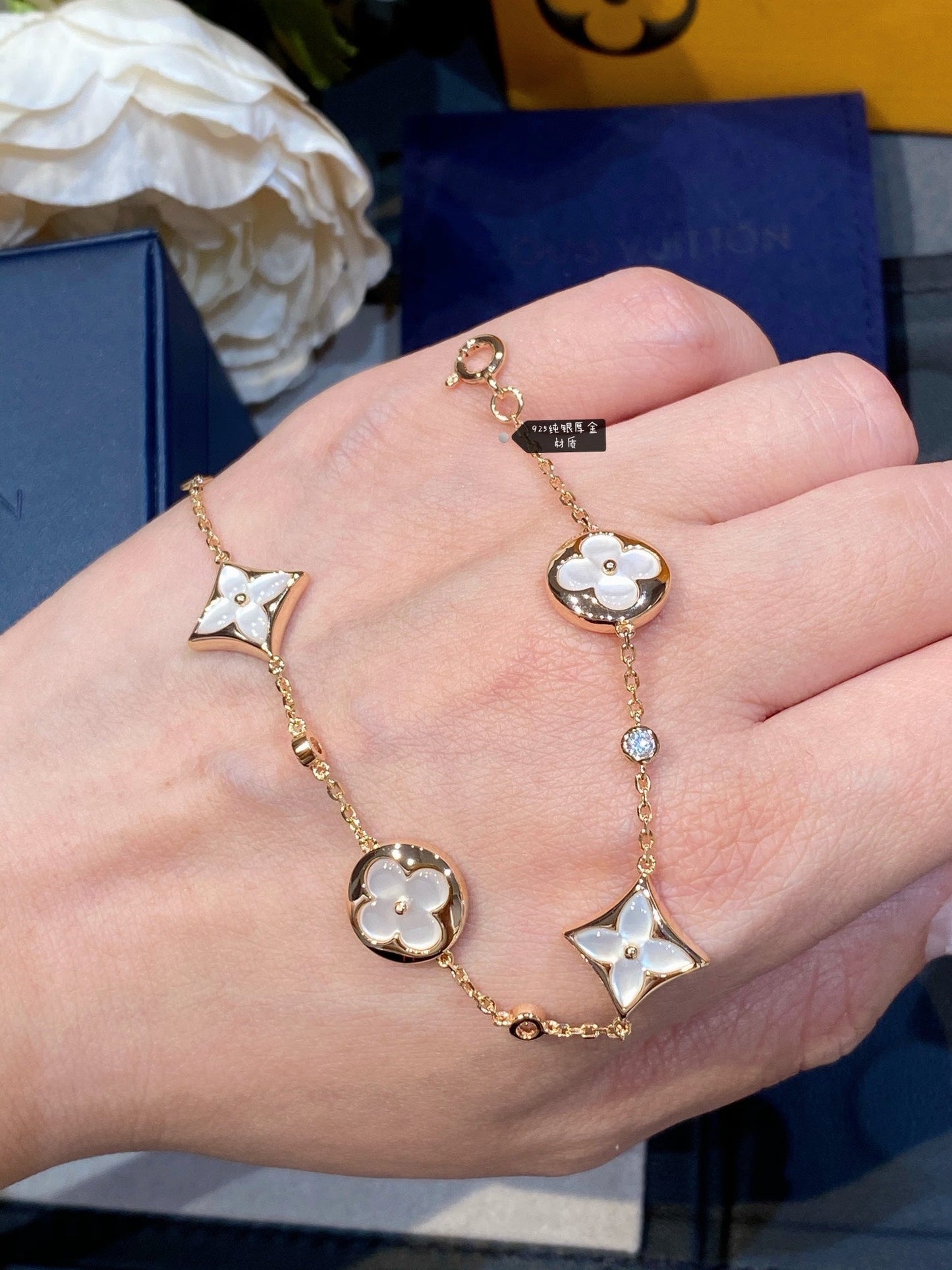 LUXEIFY STAR AND SUN 4 MOTIF WHITE MOP PINK GOLD BRACELET