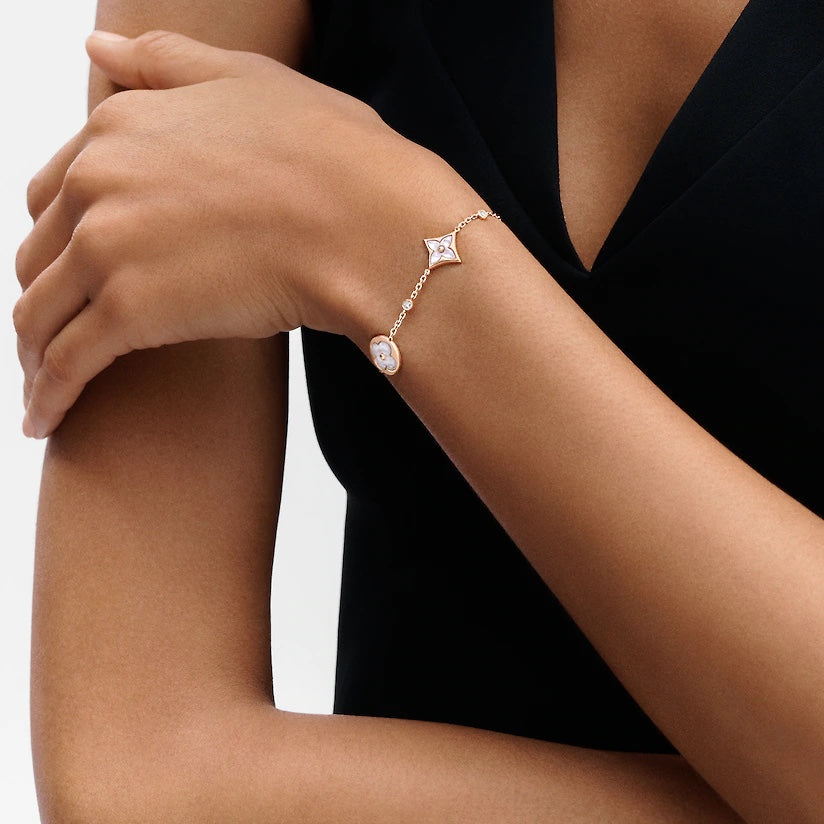 LUXEIFY STAR AND SUN 4 MOTIF WHITE MOP PINK GOLD BRACELET