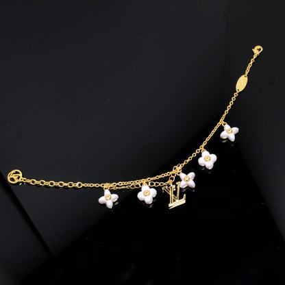 LUXEIFY LOGO 6 MOTIF STAR AND SUN GOLD BRACELET