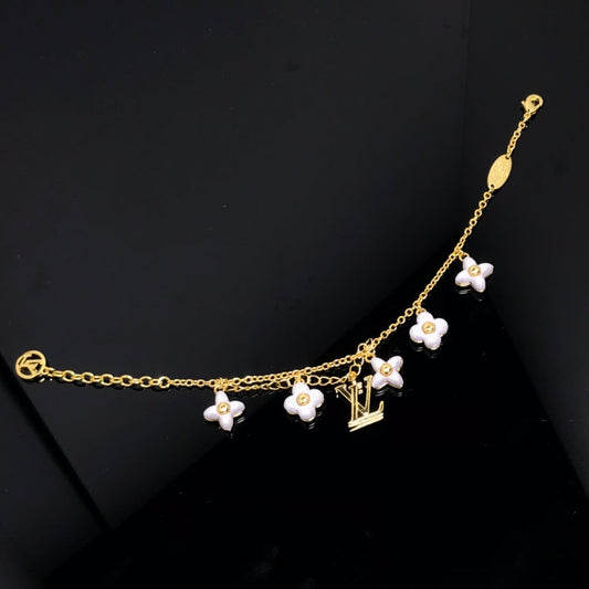 LUXEIFY LOGO 6 MOTIF STAR AND SUN GOLD BRACELET