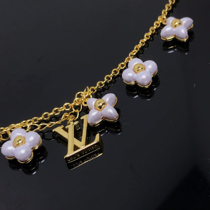 LUXEIFY LOGO 6 MOTIF STAR AND SUN GOLD BRACELET