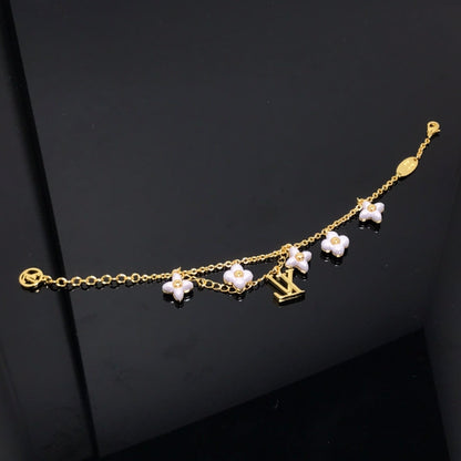 LUXEIFY LOGO 6 MOTIF STAR AND SUN GOLD BRACELET