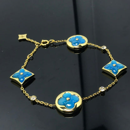 LUXEIFY STAR AND SUN 4 MOTIF BLUE BRACELET